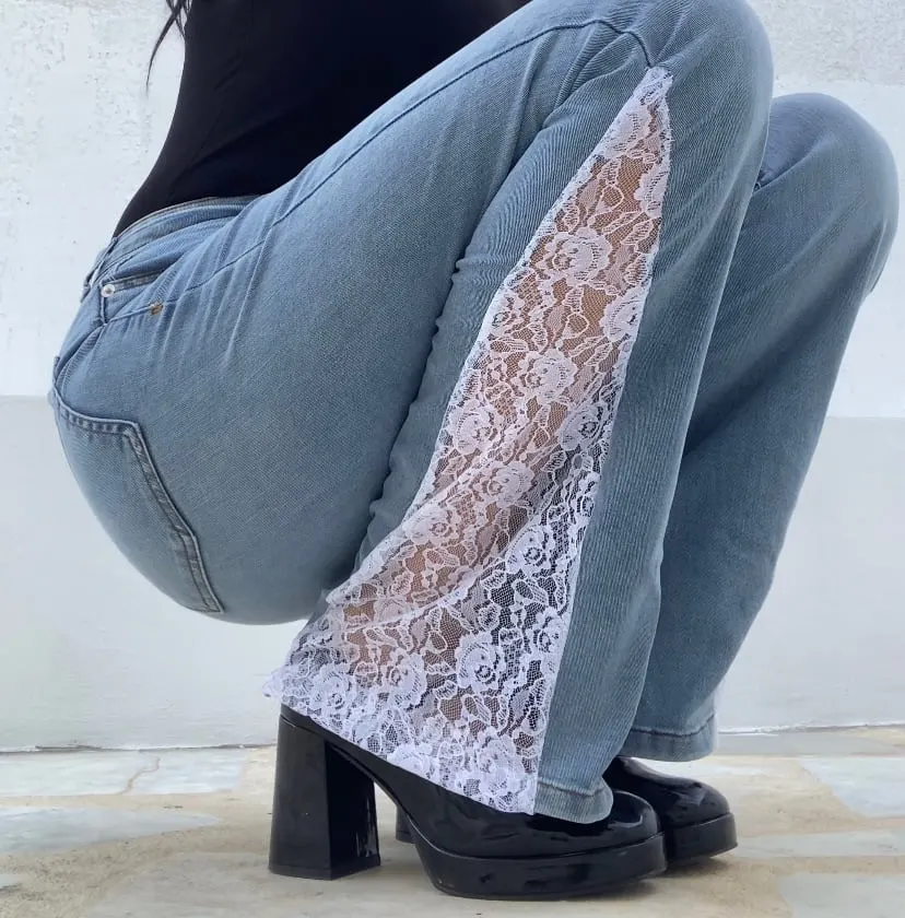 Pale lace panel on light denim